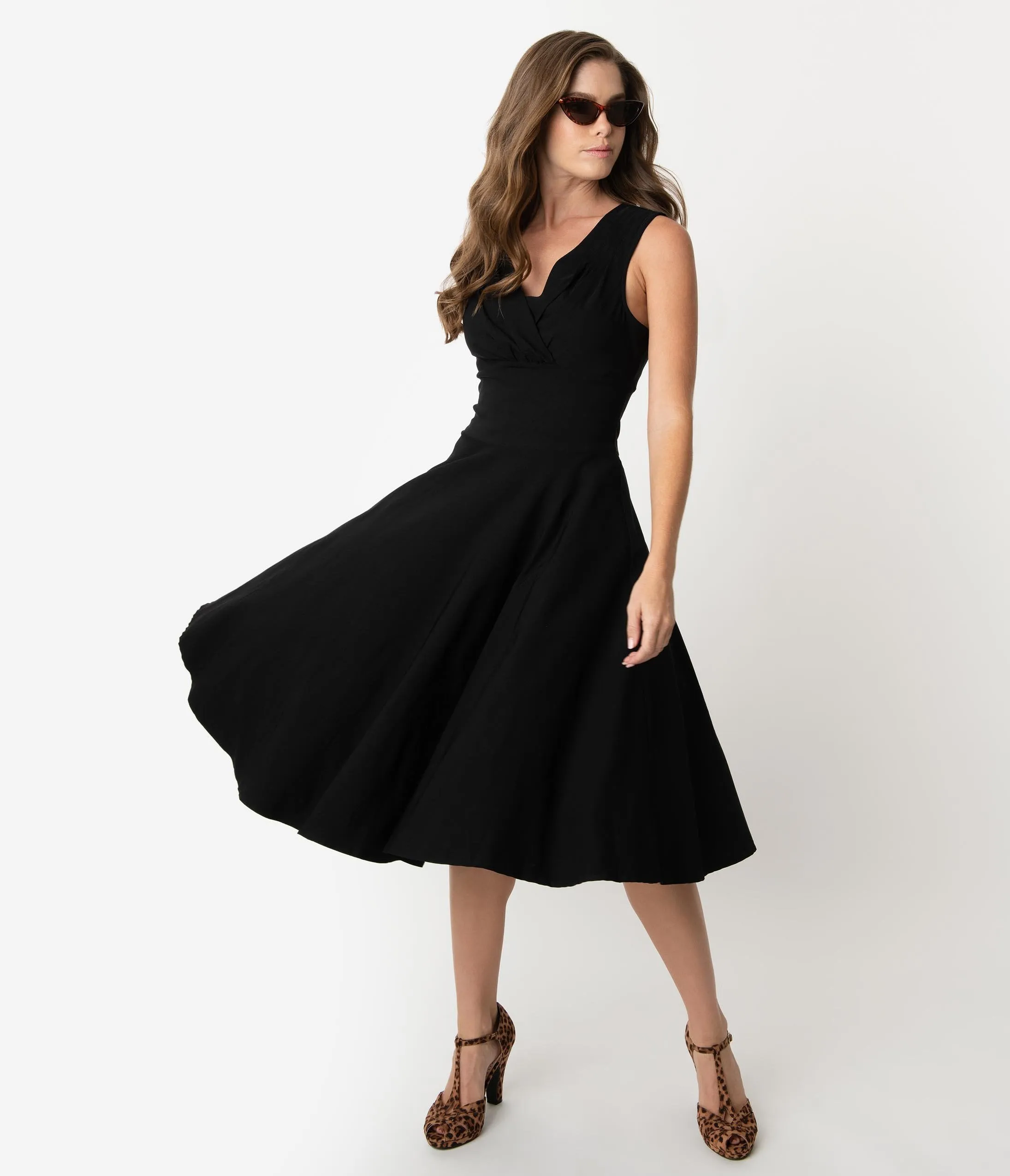 Unique Vintage 1950s Black Sleeveless Delores Swing Dress